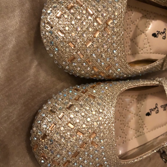 Girl’s gold sequined Mary Jane dress shoes with light blue accents. - Picture 2 of 6